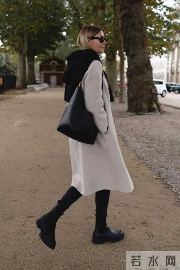 今年冬天流行一种穿搭,叫“靴中裤”,时髦保暖又减龄