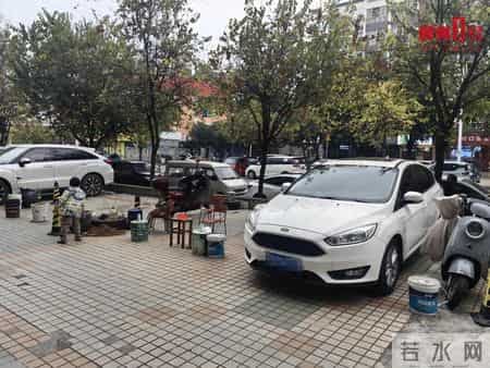 居民闹心！柳州一小区商铺前“停车位”被商户长期占用？物业回应